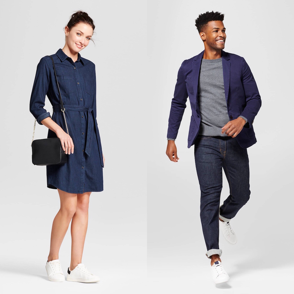 A white woman wearing a dark denim shirt dress, and a black man wearing a T-shirt and jeans with a blue blazer