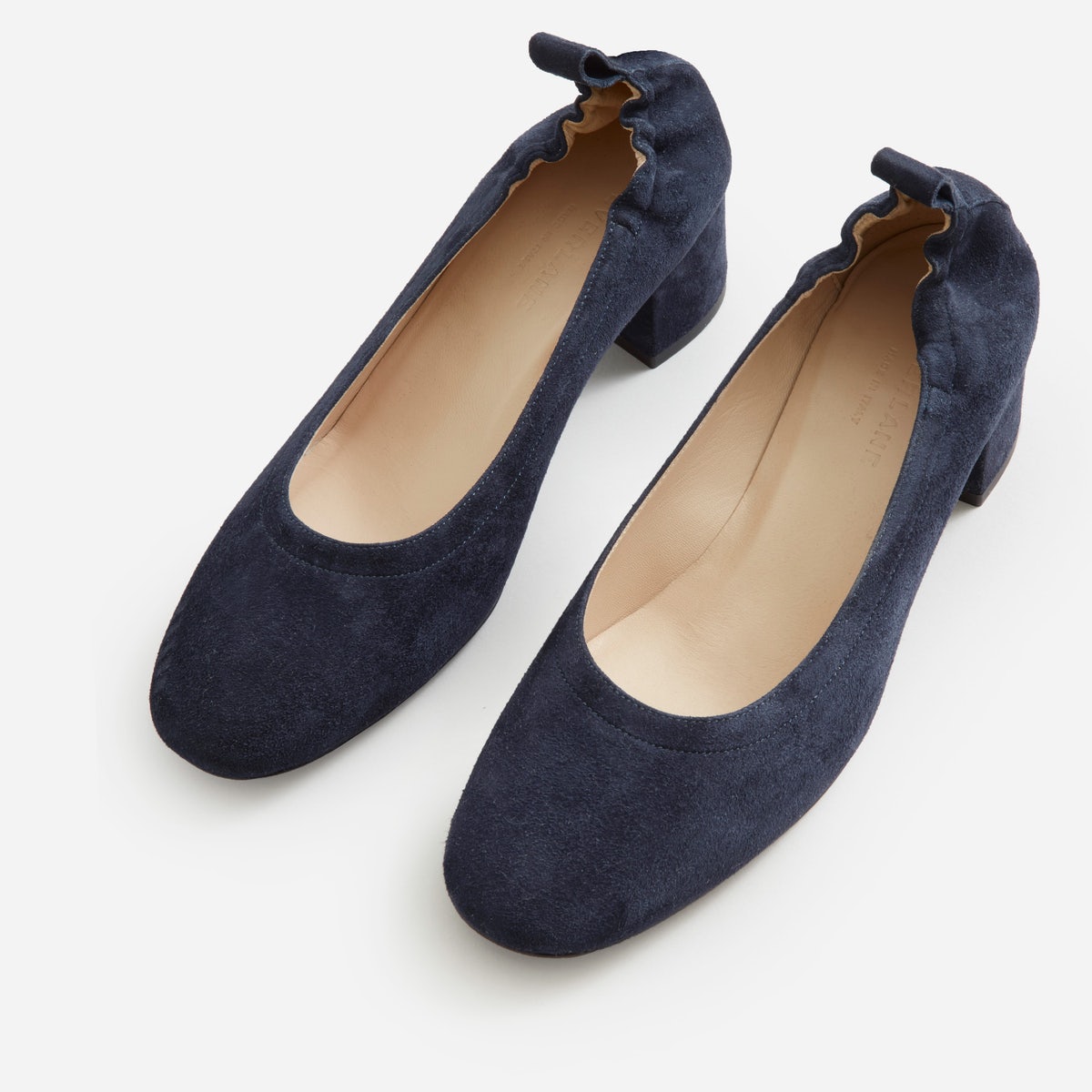 Everlane day heel, as seen from above. It has a rounded toe and elastic back.