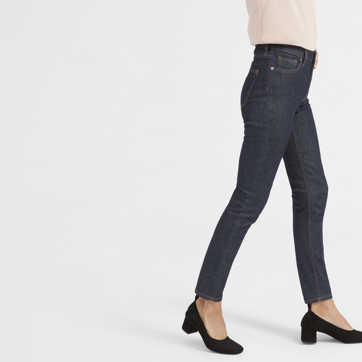 Everlane High Rise Skinny Jeans, as worn by a model.