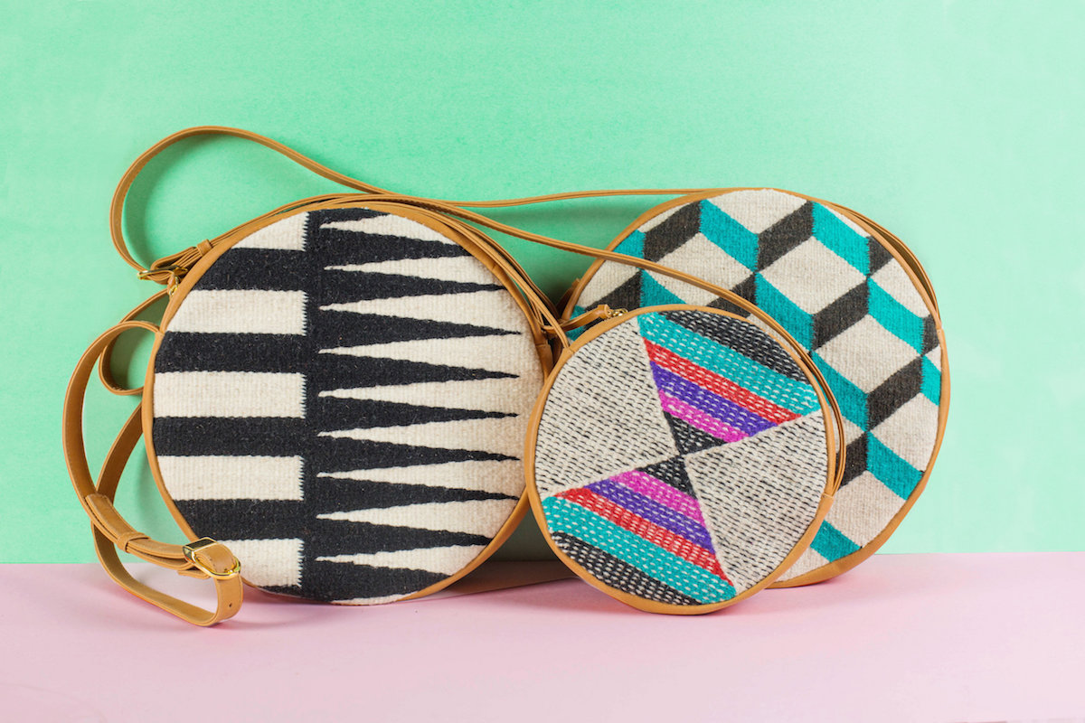 Circular purses made with woven textiles and leather.