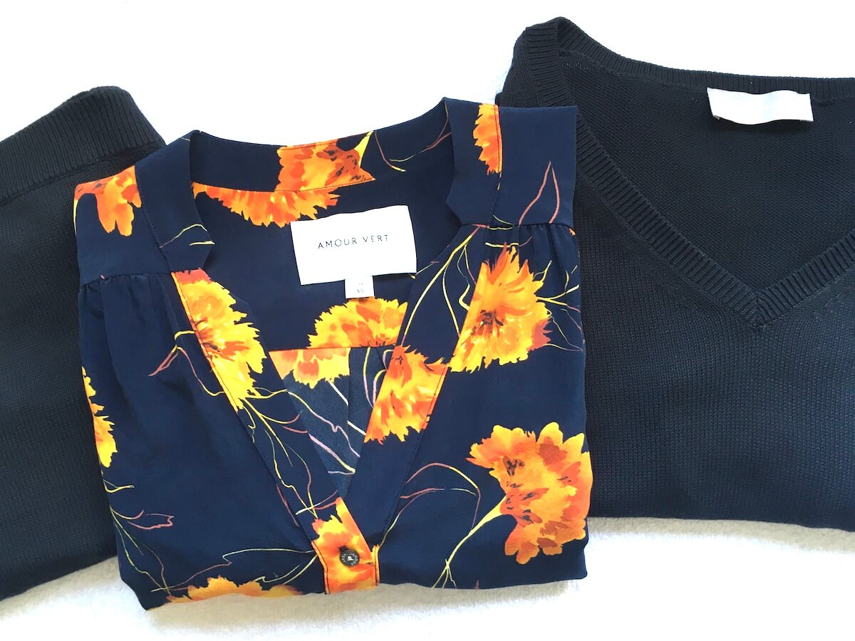 Welcome Objects Shopping Diary: a flat lay with neatly folded clothing. One is a floral shirt.
