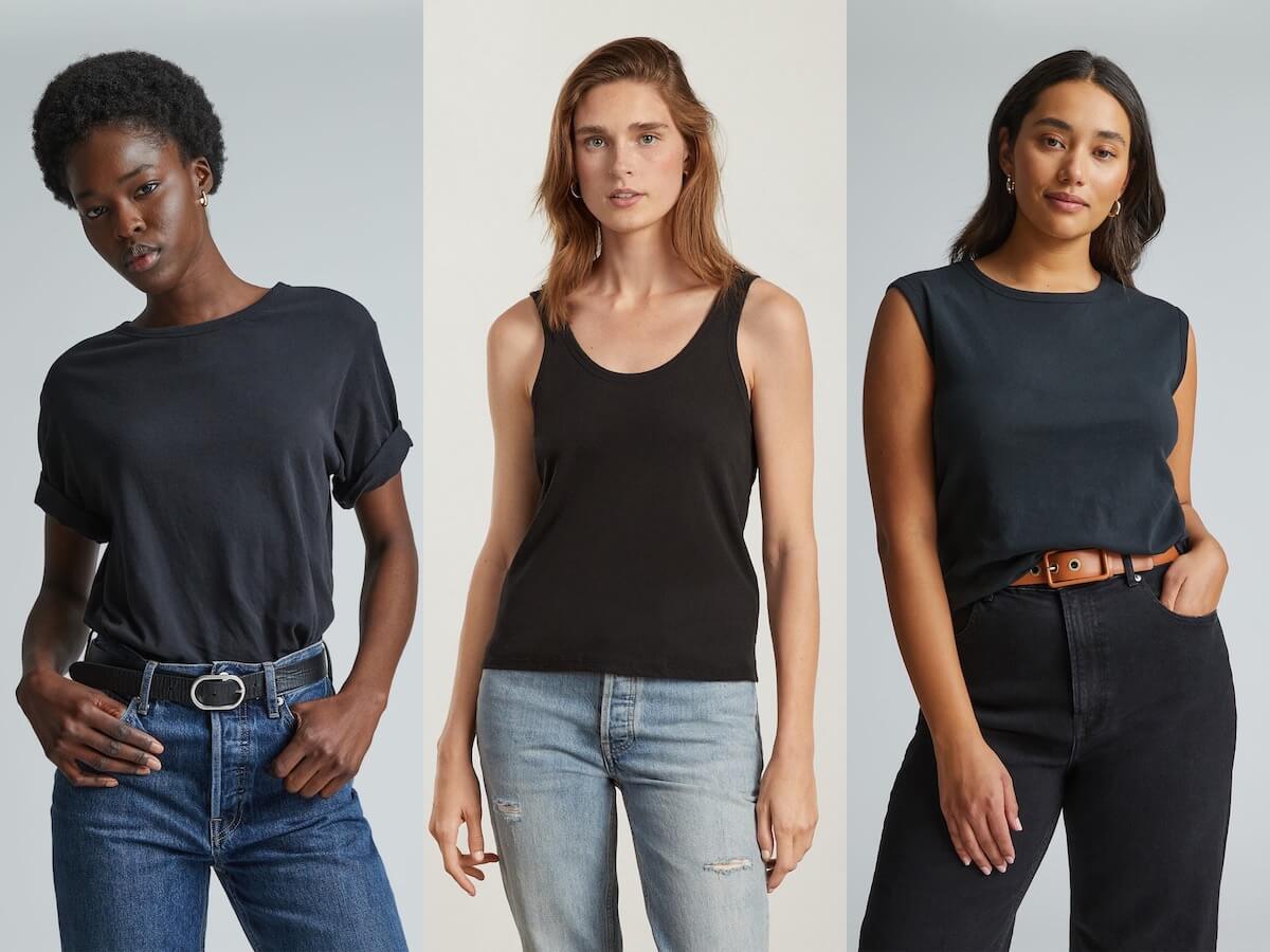 Three models wearing black tops from Everlane.