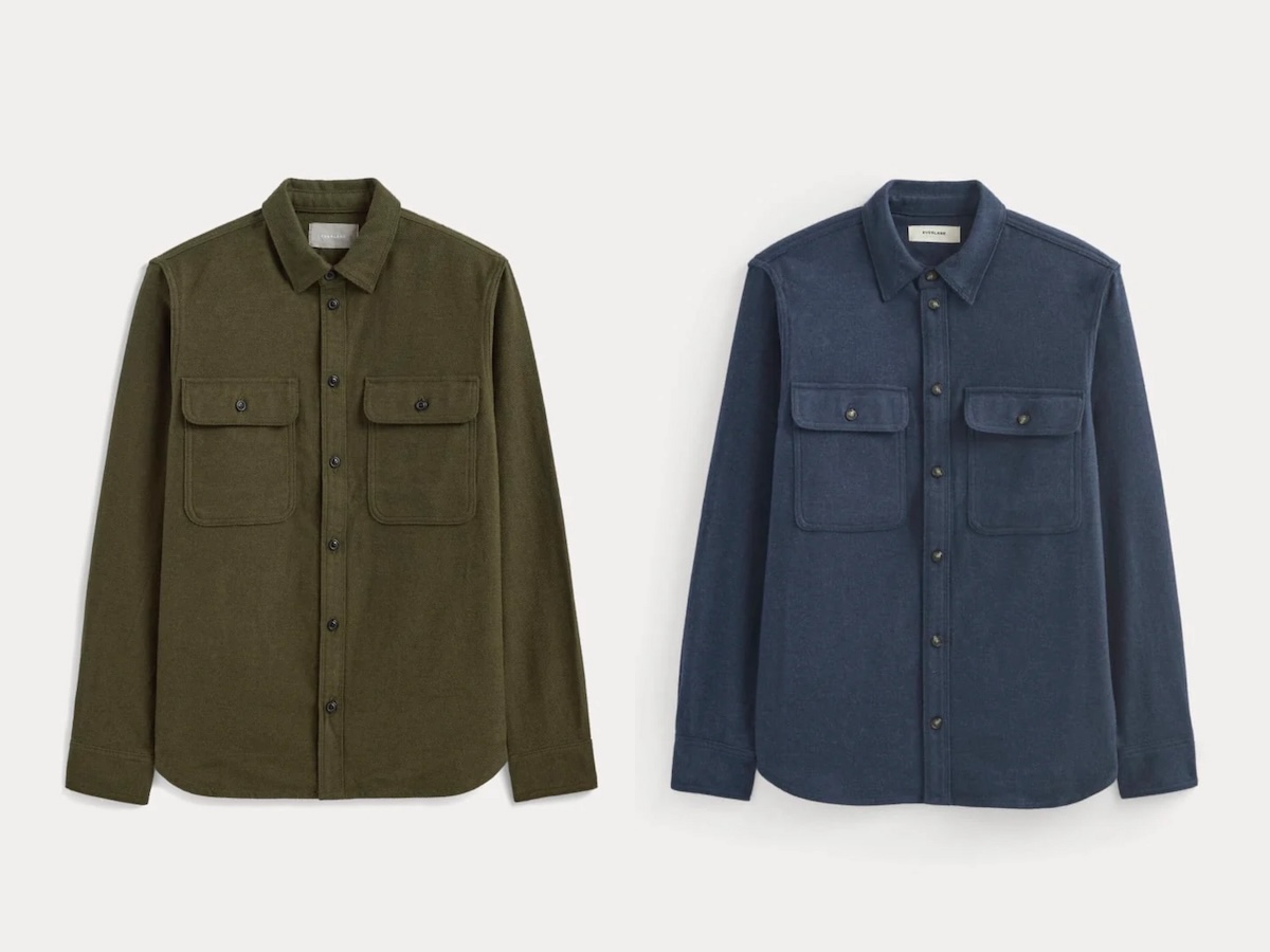 Two long-sleeved button up shirts shirts with two flapped pockets, in an olive green and dark blue.